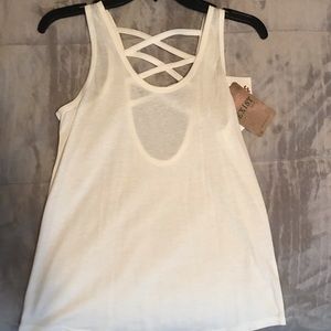 size small; basic white tank top, w/ detailed back